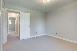 Photo 11: 34 6503 RANCHVIEW Drive NW in Calgary: Ranchlands Row/Townhouse for sale : MLS®# A1018661