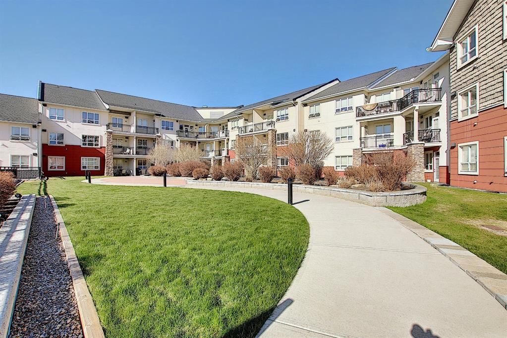 Main Photo: 213 26 VAL GARDENA View SW in Calgary: Springbank Hill Apartment for sale : MLS®# A1095989