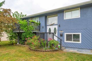 Photo 2: 4410 207A Street in Langley: Langley City House for sale : MLS®# R2798590
