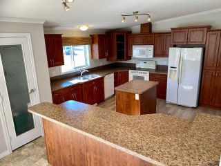 Photo 9: 128 MCCONACHIE CREEK Road in Fort Nelson: Fort Nelson - Rural Manufactured Home for sale : MLS®# R2722562