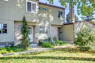 Photo 2: 205 4500 39 Street NW in Calgary: Varsity Row/Townhouse for sale : MLS®# A2004077