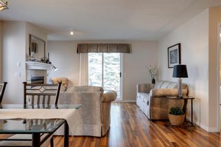 Photo 12: 1704 7171 Coach Hill Road SW in Calgary: Coach Hill Row/Townhouse for sale : MLS®# A1199169