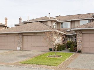 Photo 1: 102 6090 W BOUNDARY Drive in Surrey: Panorama Ridge Townhouse for sale in "Lakewood Estates" : MLS®# F1434141