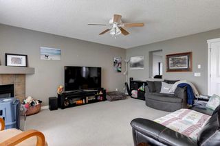 Photo 18: 35 Cougarstone Landing SW in Calgary: Cougar Ridge Detached for sale : MLS®# A2063797