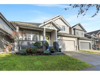 Photo 2: 19731 BLANEY Drive in Pitt Meadows: South Meadows House for sale in "BONSON'S LANDING" : MLS®# R2638931
