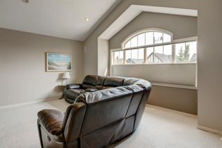 Photo 11: 175 Cougarstone Court SW in Calgary: Cougar Ridge Detached for sale : MLS®# A1130400