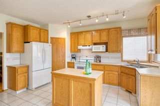 Photo 12: 48 Arbour Ridge Mews NW in Calgary: Arbour Lake Detached for sale : MLS®# A1212459