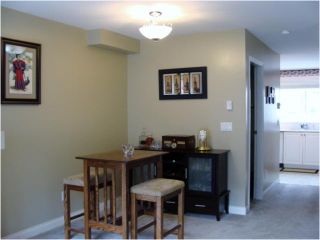 Photo 2: 32 1561 BOOTH Avenue in Coquitlam: Maillardville Townhouse for sale in "THE COURCELLES" : MLS®# V942779