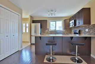 Photo 10: 86 Sunset Road: Cochrane Row/Townhouse for sale : MLS®# A2011794