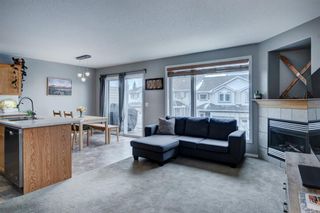 Photo 5: 72 Rocky Vista Circle NW in Calgary: Rocky Ridge Row/Townhouse for sale : MLS®# A1198302