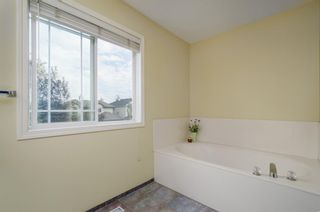Photo 20: 85 STRATHRIDGE Close SW in Calgary: Strathcona Park Detached for sale : MLS®# A1019965