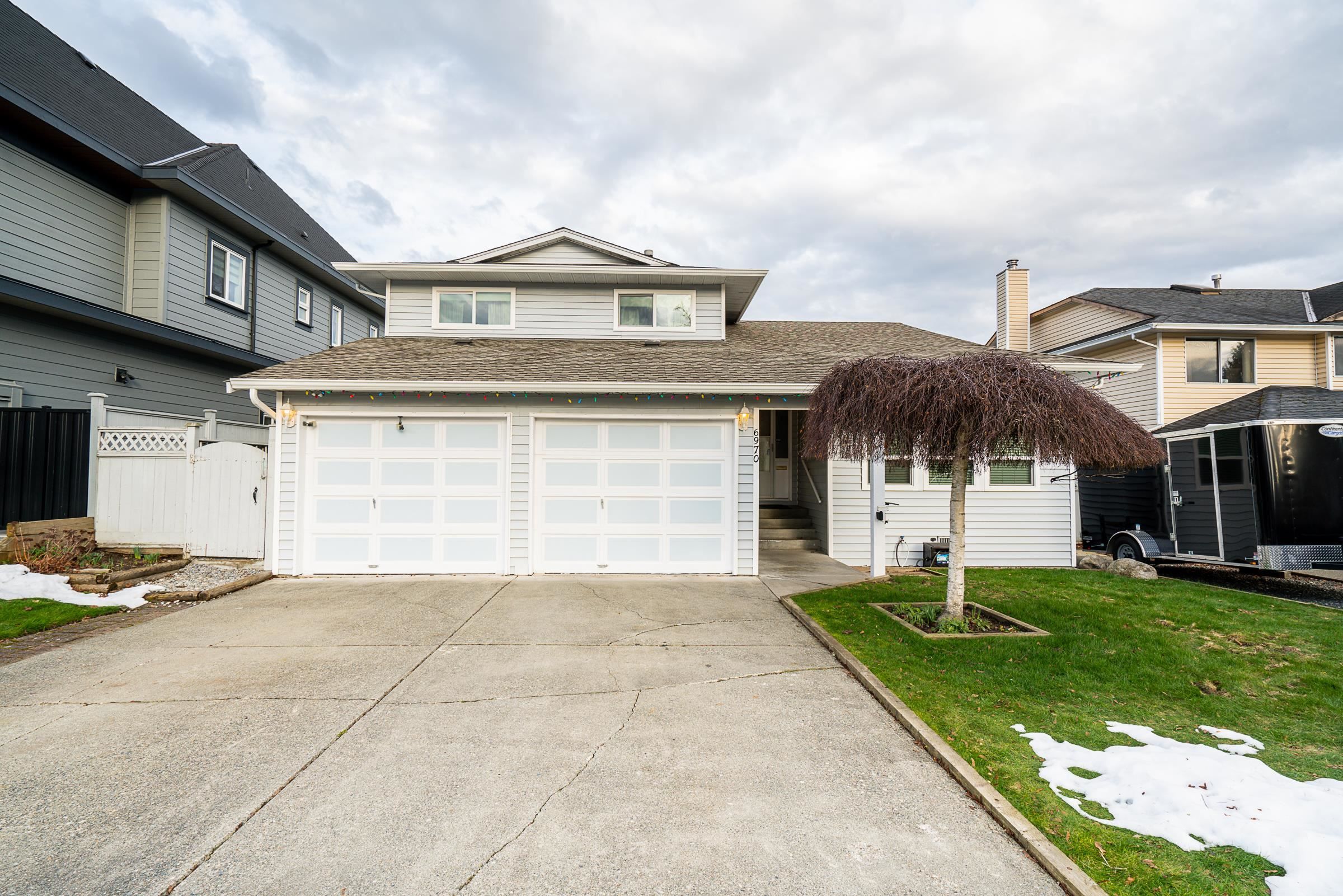 Main Photo: 6970 129A Street in Surrey: West Newton House for sale : MLS®# R2757846