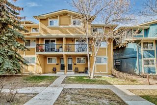 Main Photo: 104 2200 Woodview Drive SW in Calgary: Woodlands Row/Townhouse for sale : MLS®# A2047963