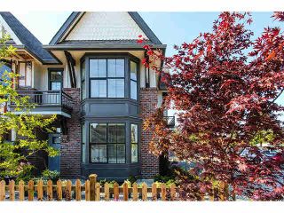 Photo 1: 29 33460 LYNN Avenue in Abbotsford: Central Abbotsford Townhouse for sale in "ASTON ROW" : MLS®# F1440566