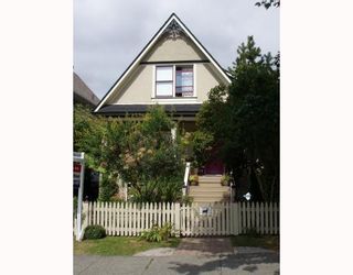 Photo 1: 1819 E 8TH Avenue in Vancouver: Grandview VE House for sale (Vancouver East)  : MLS®# V782842