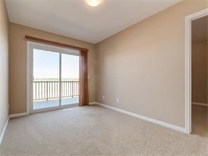 Photo 3: 4052 Windsong Boulevard SW in Airdrie: windsong House for sale : MLS®# C4120616