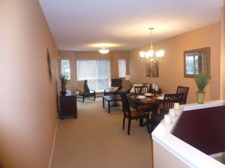Photo 6: 305 5499 203RD Street in Langley: Langley City Condo for sale in "PIONEER PLACE" : MLS®# F1432247