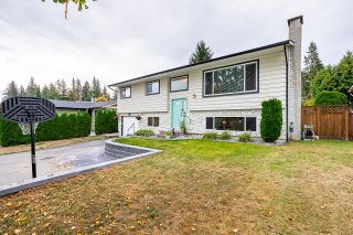 Photo 1: 20220 48 Avenue in Langley: Langley City House for sale : MLS®# R2739566