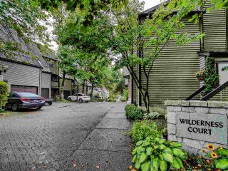 Photo 1: 8551 WILDERNESS Court in Burnaby: Forest Hills BN Townhouse for sale in "Simon Fraser Village" (Burnaby North)  : MLS®# R2490108