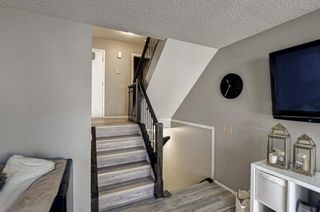 Photo 11: 13 140 Point Drive NW in Calgary: Point McKay Row/Townhouse for sale : MLS®# A1205308
