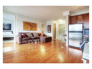 Photo 1: 210 2055 YUKON Street in Vancouver: False Creek Condo for sale in "MONTREUX" (Vancouver West)  : MLS®# V937157