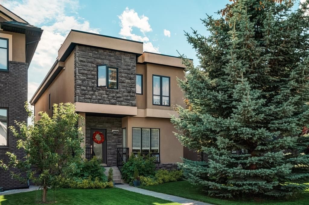 West Coast inspired home on a 30x125 ft South exposed lot in the Heart of Marda Loop!