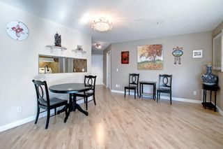 Photo 5: 402 33 Arbour Grove Close NW in Calgary: Arbour Lake Apartment for sale : MLS®# A1241662
