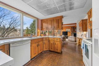 Photo 12: 27 Strabane Place SW in Calgary: Strathcona Park Detached for sale : MLS®# A2128157