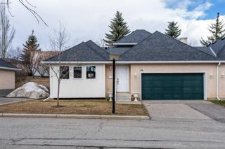 Photo 1: 34 Candle Terrace SW in Calgary: Canyon Meadows Row/Townhouse for sale : MLS®# A2121544