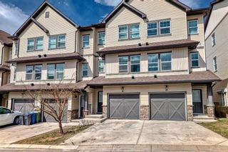 Photo 1: 81 28 Heritage Drive: Cochrane Row/Townhouse for sale : MLS®# A2129333