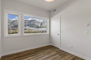Photo 9: 17 209 Stewart Creek Rise: Canmore Row/Townhouse for sale : MLS®# A2032138