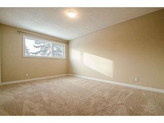 Photo 12: 1708 107 Avenue SW in Calgary: Braeside_Braesde Est Residential Detached Single Family for sale : MLS®# C3651455