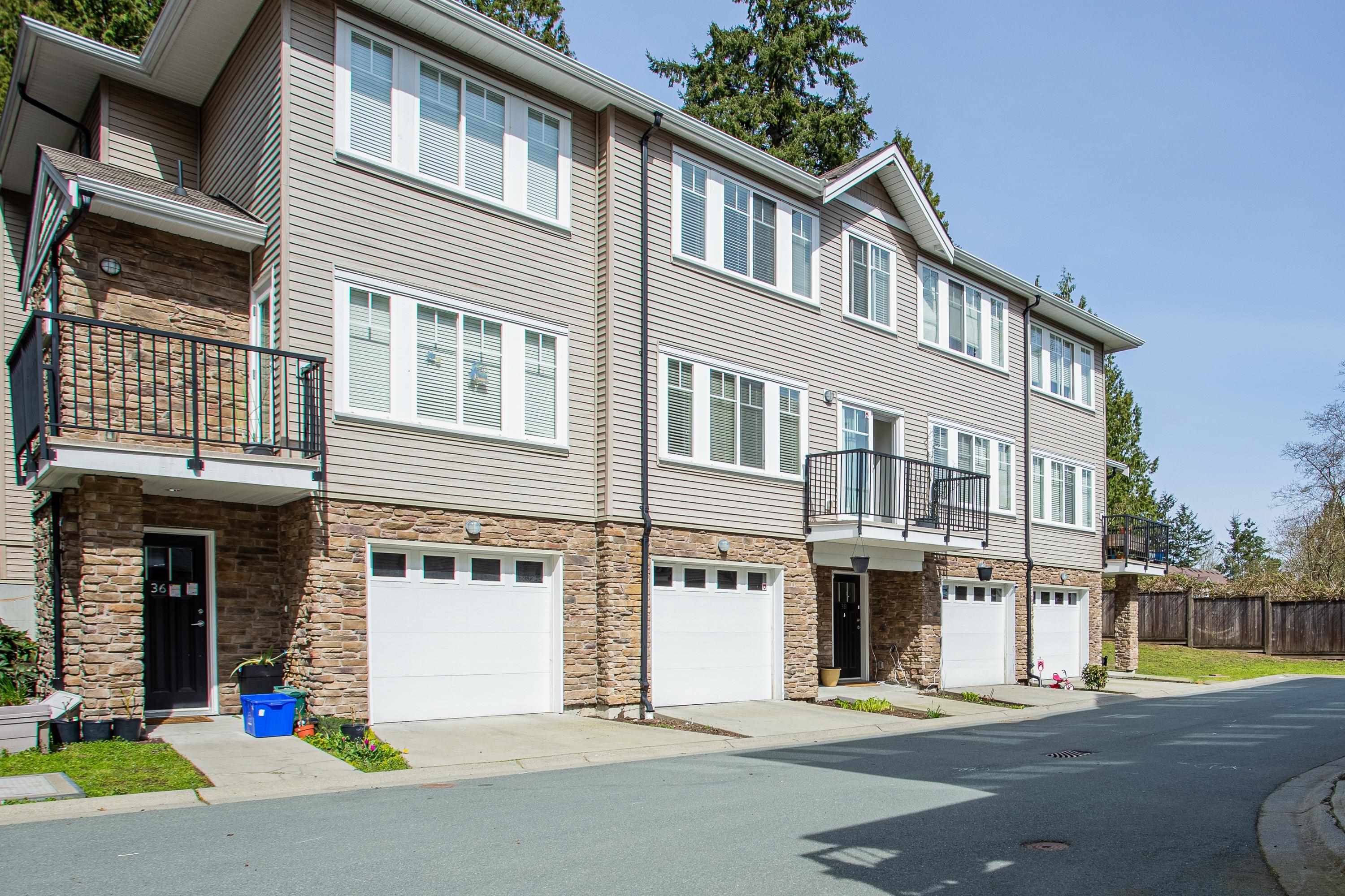 Main Photo: 37 13864 HYLAND Road in Surrey: East Newton Townhouse for sale in "TEO TOWNHOMES" : MLS®# R2674210
