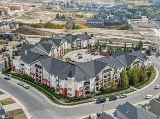 Photo 1: 325 26 Val Gardena View SW in Calgary: Springbank Hill Apartment for sale : MLS®# A2083293