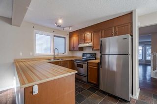Photo 13: 47 Strathearn Crescent SW in Calgary: Strathcona Park Detached for sale : MLS®# A2105994
