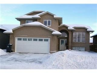 Photo 1: 207 Brookside Court: Warman Single Family Dwelling for sale (Saskatoon NW)  : MLS®# 388565