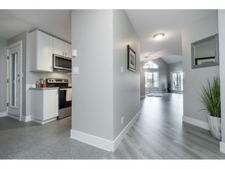 Photo 3: 406 20288 54 Avenue in Langley: Langley City Condo for sale in "Langley City" : MLS®# R2432392