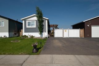 Photo 1: 297 McKinlay Crescent: Fort McMurray Detached for sale : MLS®# A2033981