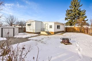 Photo 4: 809 Bayview Crescent: Strathmore Detached for sale : MLS®# A1172291