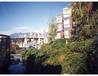 Photo 1: 1555 MARINER Walk in Vancouver: False Creek Townhouse for sale in "LAGOONS" (Vancouver West)  : MLS®# V696953
