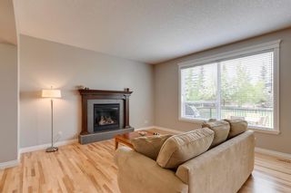 Photo 7: 124 Cougartown Close SW in Calgary: Cougar Ridge Detached for sale : MLS®# A2051695