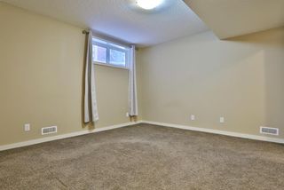 Photo 19: 86 Sunset Road: Cochrane Row/Townhouse for sale : MLS®# A2011794