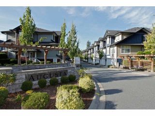 Photo 1: 111 18199 70TH Avenue in Surrey: Cloverdale BC Townhouse for sale in "AUGUSTA" (Cloverdale)  : MLS®# F1425143