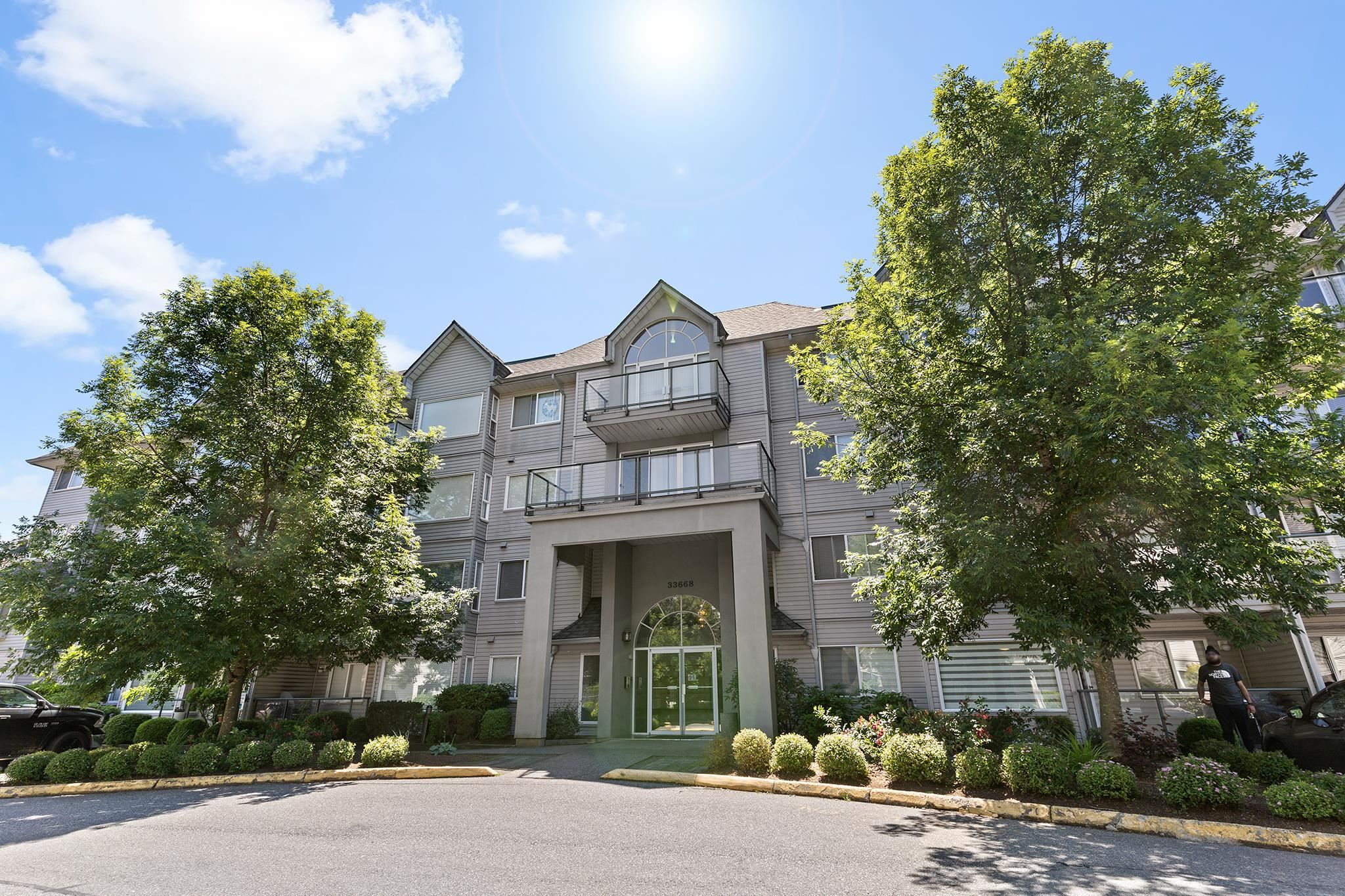 Main Photo: 210 33668 KING Road in Abbotsford: Poplar Condo for sale in "College Park" : MLS®# R2704196