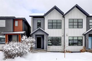 Photo 1: 517 36 Street SW in Calgary: Spruce Cliff Semi Detached (Half Duplex) for sale : MLS®# A2120598