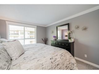 Photo 17: 313 13727 74 Avenue in Surrey: East Newton Condo for sale in "King's Court" : MLS®# R2702050