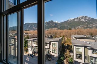 Photo 4: 409 1211 VILLAGE GREEN Way in Squamish: Downtown SQ Condo for sale in "Rockcliff at Eaglewind" : MLS®# R2864593