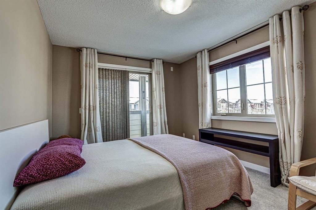 Photo 25: Photos: 230 EVERSYDE Boulevard SW in Calgary: Evergreen Apartment for sale : MLS®# A1071129
