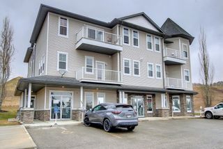Photo 2: 205 144 Crescent Road: Okotoks Apartment for sale : MLS®# A1209503