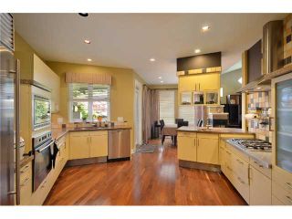 Photo 4: 4825 BARKER Crescent in Burnaby: Garden Village House for sale (Burnaby South)  : MLS®# V902284